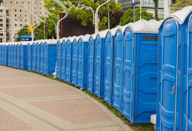 portable restrooms with sink and hand sanitizer stations, available at a festival in Asbury Park NJ